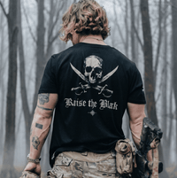 Raise The Black T-Shirt military graphic tee with skull and crossed swords — veteran-owned British military apparel
