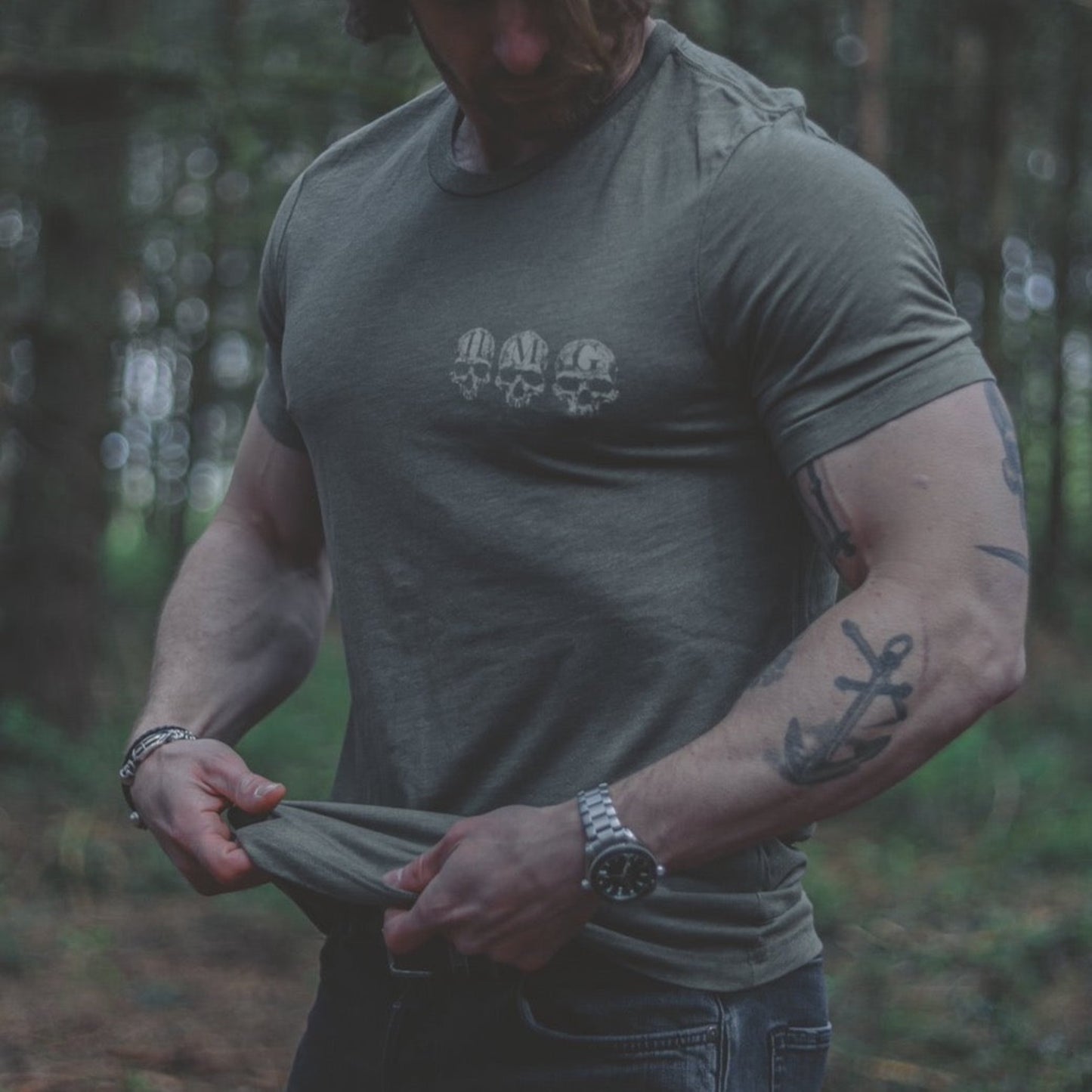 
                  
                    Front of Olive Green HMG Clothing Slim Fit T-shirt being worn.
                  
                